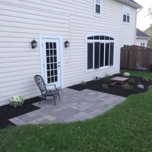Transforming Your Outdoor Space: Installing Paver Walkways and Patios