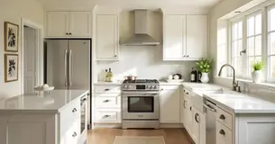 A stylish kitchen with white cabinets, complemented by thoughtfully chosen wall colors and decor.