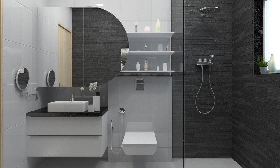 Modern bathroom with black and white tiles, a round mirror, sink, toilet, and open shower. Shelves hold decor items. Bright, clean feel.