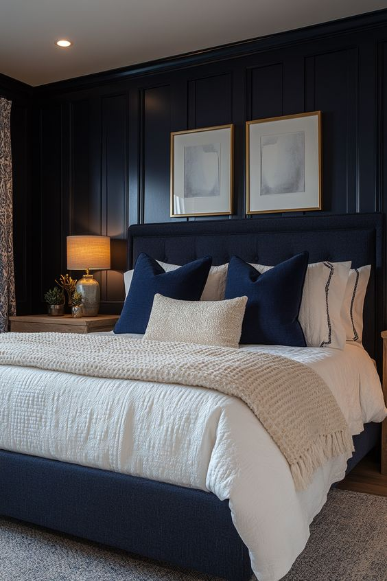 Navy blue and white striped bedroom with a coastal theme