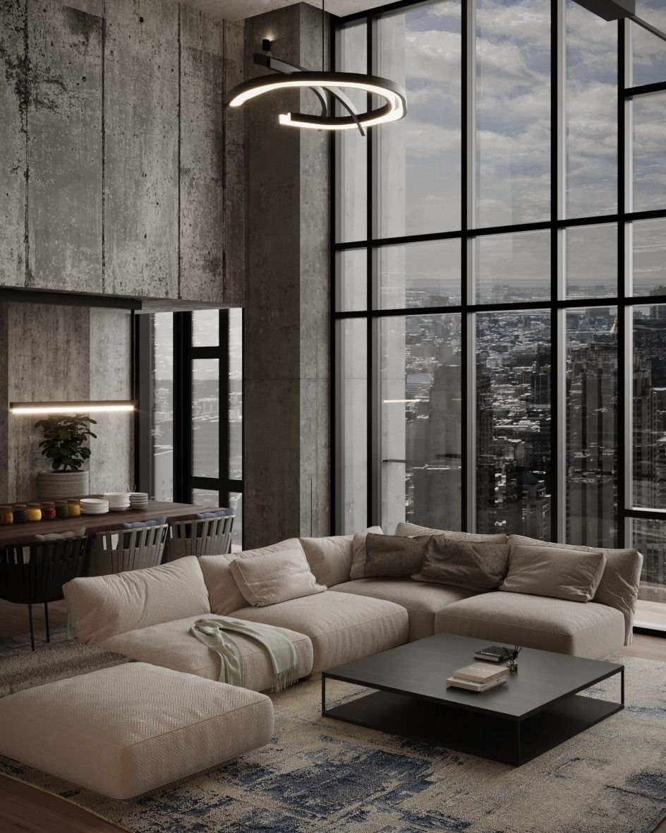 Modern living room with a beige L-shaped sofa, dark table, and pendant light. Large windows reveal a cityscape. Cozy and elegant vibe.