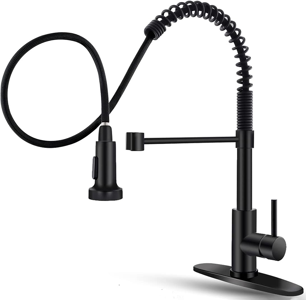 A sleek black kitchen sink faucet on a modern black countertop, with green cabinets and wood accents in the background