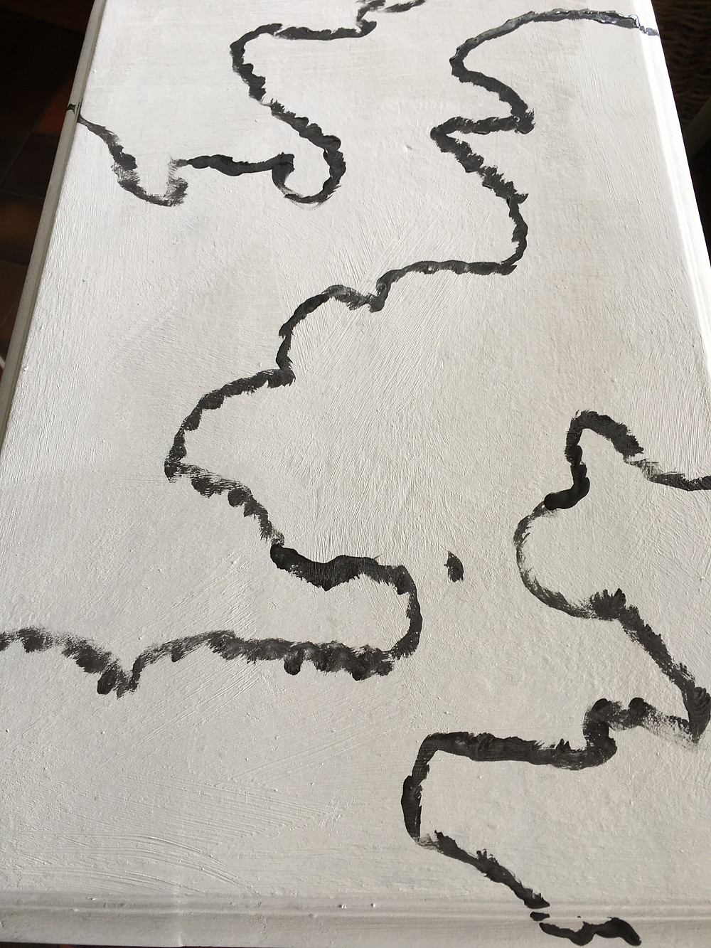 Painted with Annie Sloan Chalk Paint in Original and Graphite, this is the starting point for a marble effect finish
