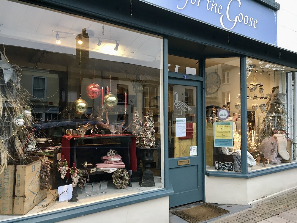 Interiors and lifestyle shop, Source for the Goose showcasing its Christmas window display in South Molton, Devon