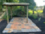 Small stone paver patio and wooden pavilion in Atlanta GA