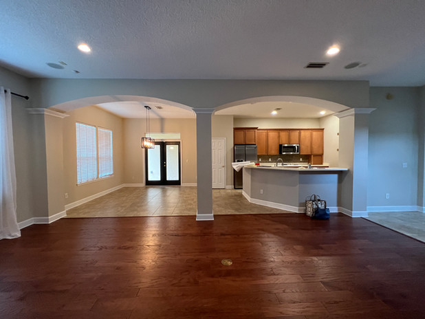 Kitchen in Jacksonville before renovation. Outdated cabinets and style.