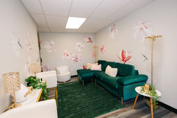 Makeup artist finishing bridal look at LUMA Suite Dublin Ohio.