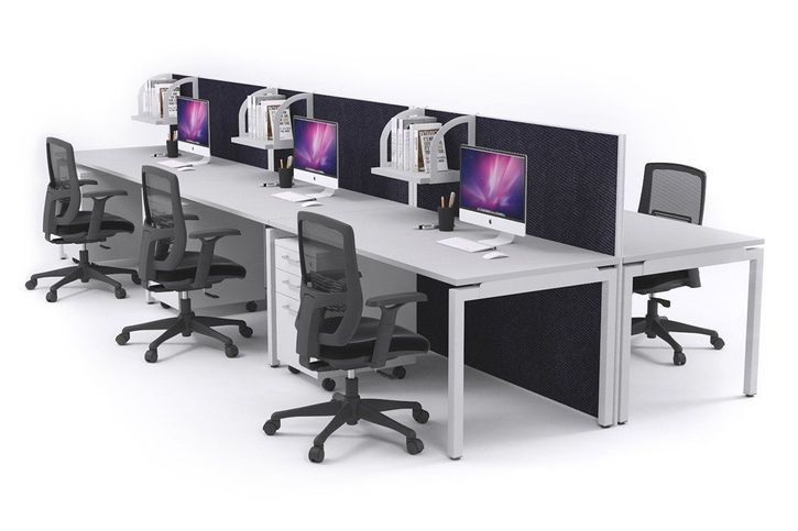 Modern office workspace with six workstations and privacy screens