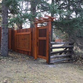 built cedar fence, zen detail, backs onto park, lattice frame for peak a boo look.