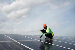 jpeg-optimizer_technician-engineer-checks-maintenance-solar-cell-panels