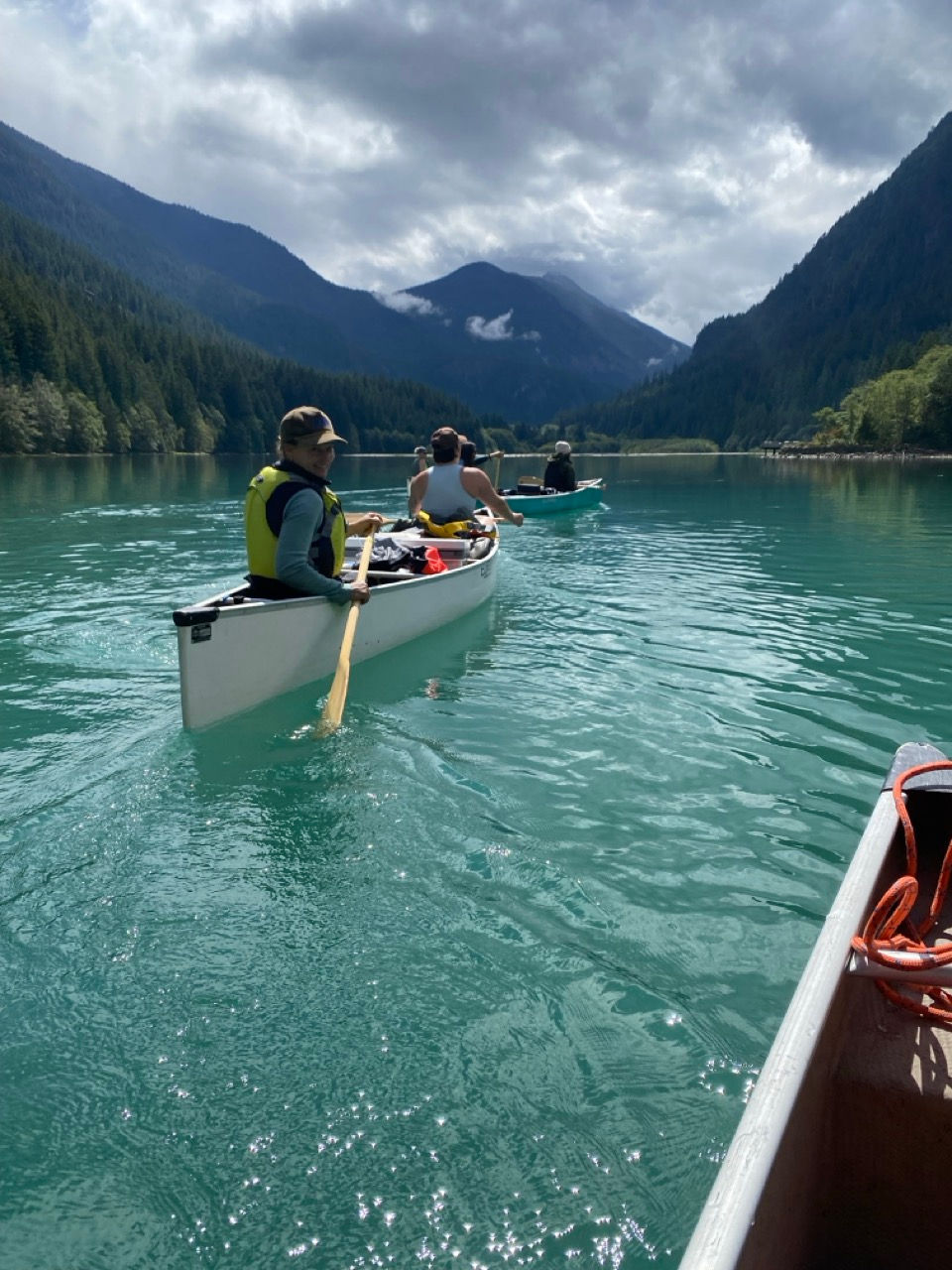 The Grounded Outdoor team in canoes on Diablo Lake in the North Cascades.
