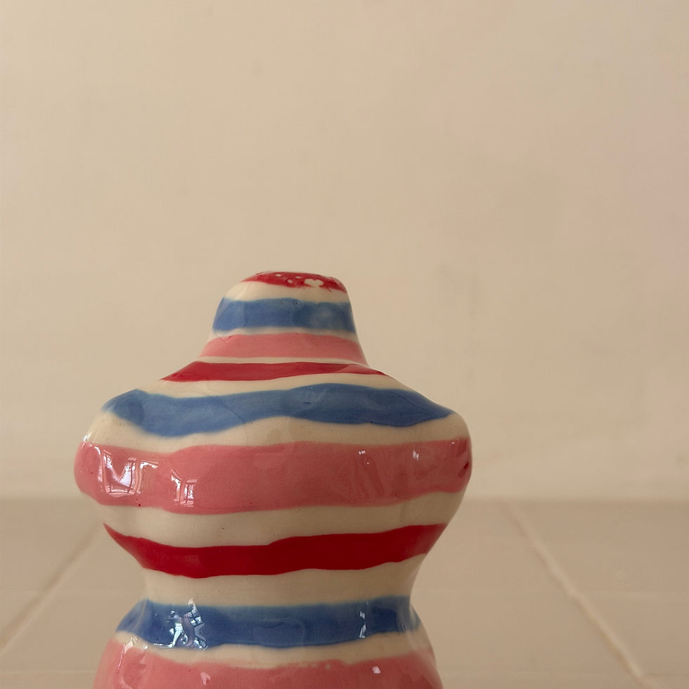 Thumbnail: Lady striped sculpture 