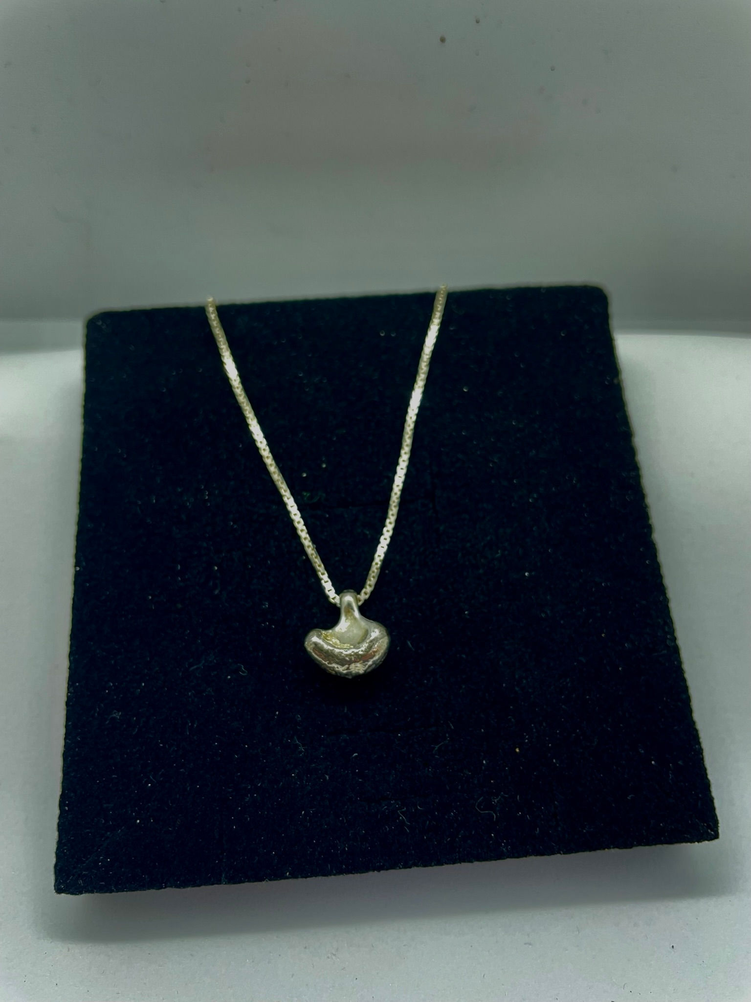 Zilveren hanger organische vorm