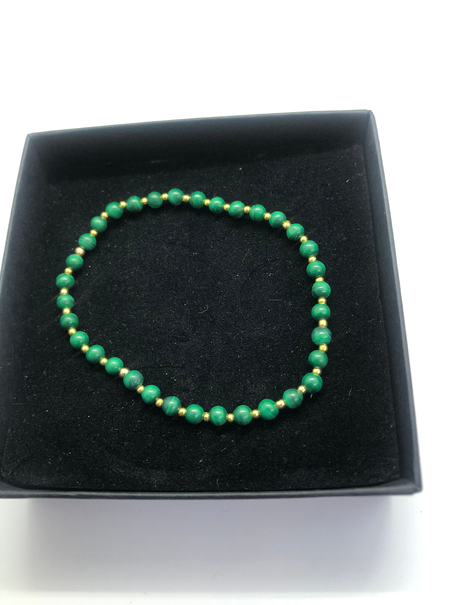 Armband malachiet en goud op zilver kraaltjes