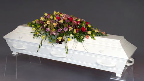 Coffin decoration in pastel for funerals and memorial services.
