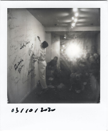 Polaroid by Alexander Si. Artist Alexander Si installation view at Chinatown Soup, Lower East Side, New York, curated by Ventiko, with ropes, chains, celebrity names on wall