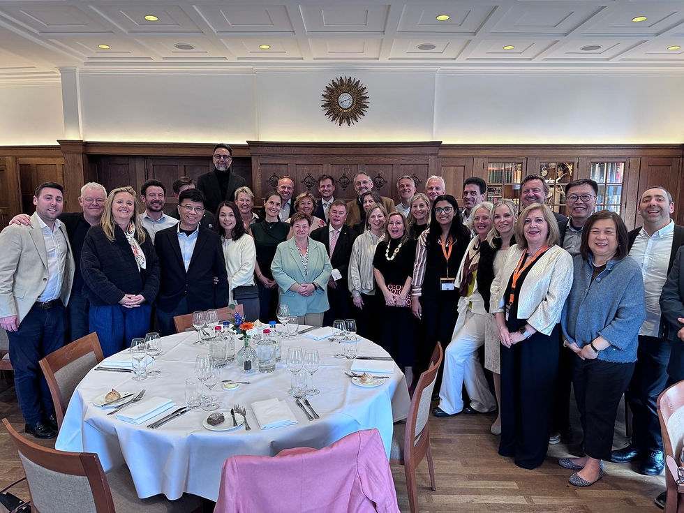 Group photo of ENEX Global Meeting attendees AMS