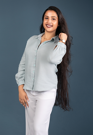 Founder wearing premium women’s outfit from NIMORA Sri Lanka, elegant modern fashion style.