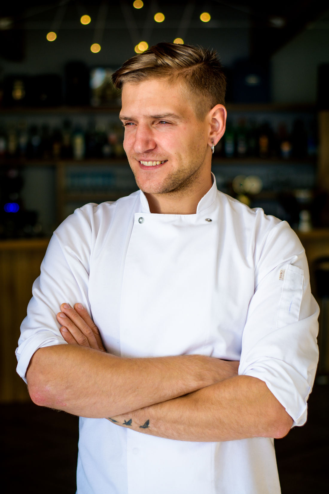Arnis Ansons in chef's whites