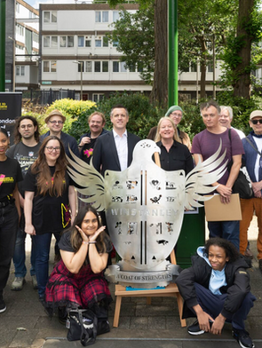 Louise Higgs - artist with 'A Coat of Strengths' Steel Sculpture co-created with residents living on the Winstanley Estate, nr. Clapham Junction, London: Part of 'Winstanley Past, Present and Future Festival 2025'. Also proudly part of the 'London Festival of Architecture 2025'.