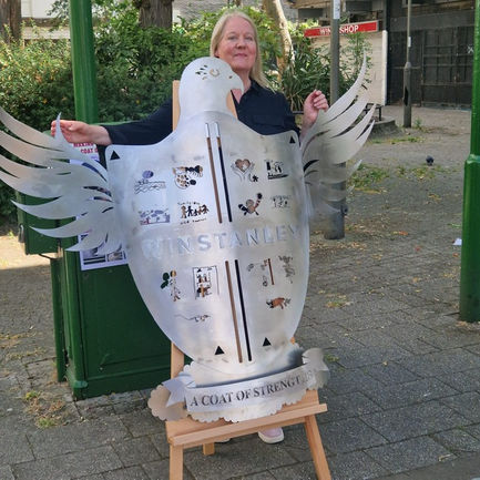 Louise Higgs - artist with 'A Coat of Strengths' Steel Sculpture co-created with residents living on the Winstanley Estate, nr. Clapham Junction, London: Part of 'Winstanley Past, Present and Future Festival 2025'. Also proudly part of the 'London Festival of Architecture 2025'.