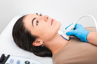 Patient undergoes ultrasound of the thyroid at the Thyroid and RFA Center for Excellence in Houston