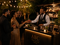 Bartender handing drink.png