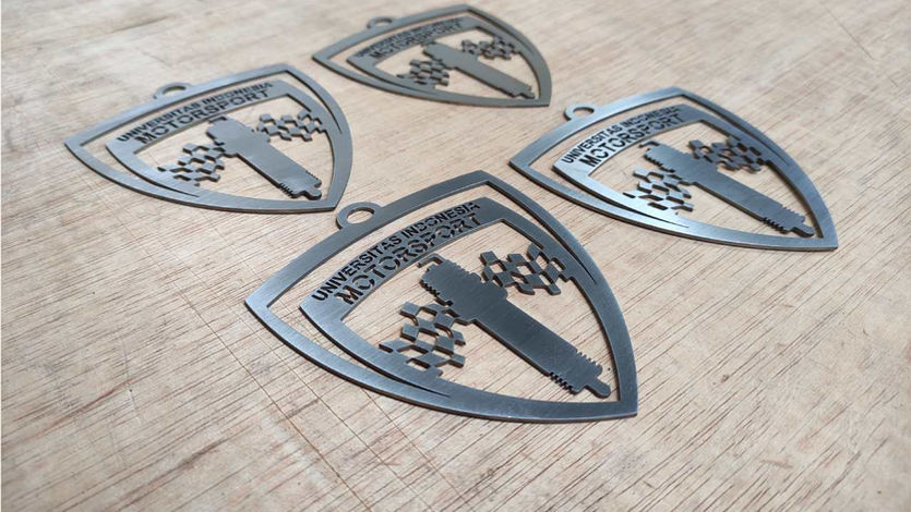 hasil laser cutting ruang cipta emblem kampus UI