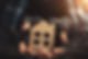 Hands of Homelessness Poor man holding the paper house hope to have family home and warm h