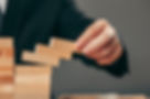 man-wooden-cubes-table-management-concept.jpg