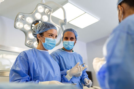 portrait-team-multiethnic-surgeons-work-operation-theatre-several-doctors-surrounding-pati