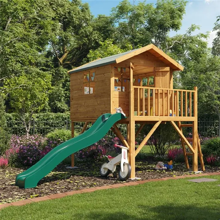 A child's wooden playhouse with slide