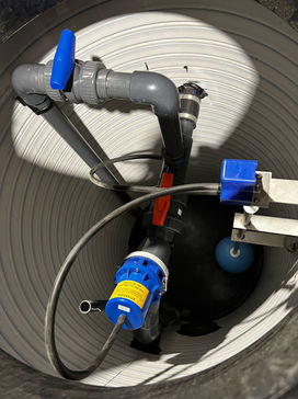 Vacuum drainage wells