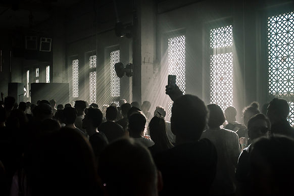 Audience in a Dark Room