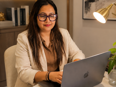 Premlata Gupta reviewing a student essay at her desk, teaching responsible AI use, Founder of Wisdom Point, ELA Expert serving NRI students globally