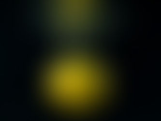 A lemon underwater with rising bubbles, illustrating how water pushes upward according to Archimedes’ Principle.