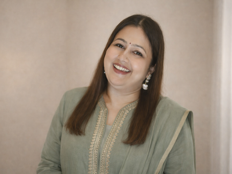 Premlata Gupta, Founder of Wisdom Point, smiling confidently, representing warmth, trust, and mentorship in education