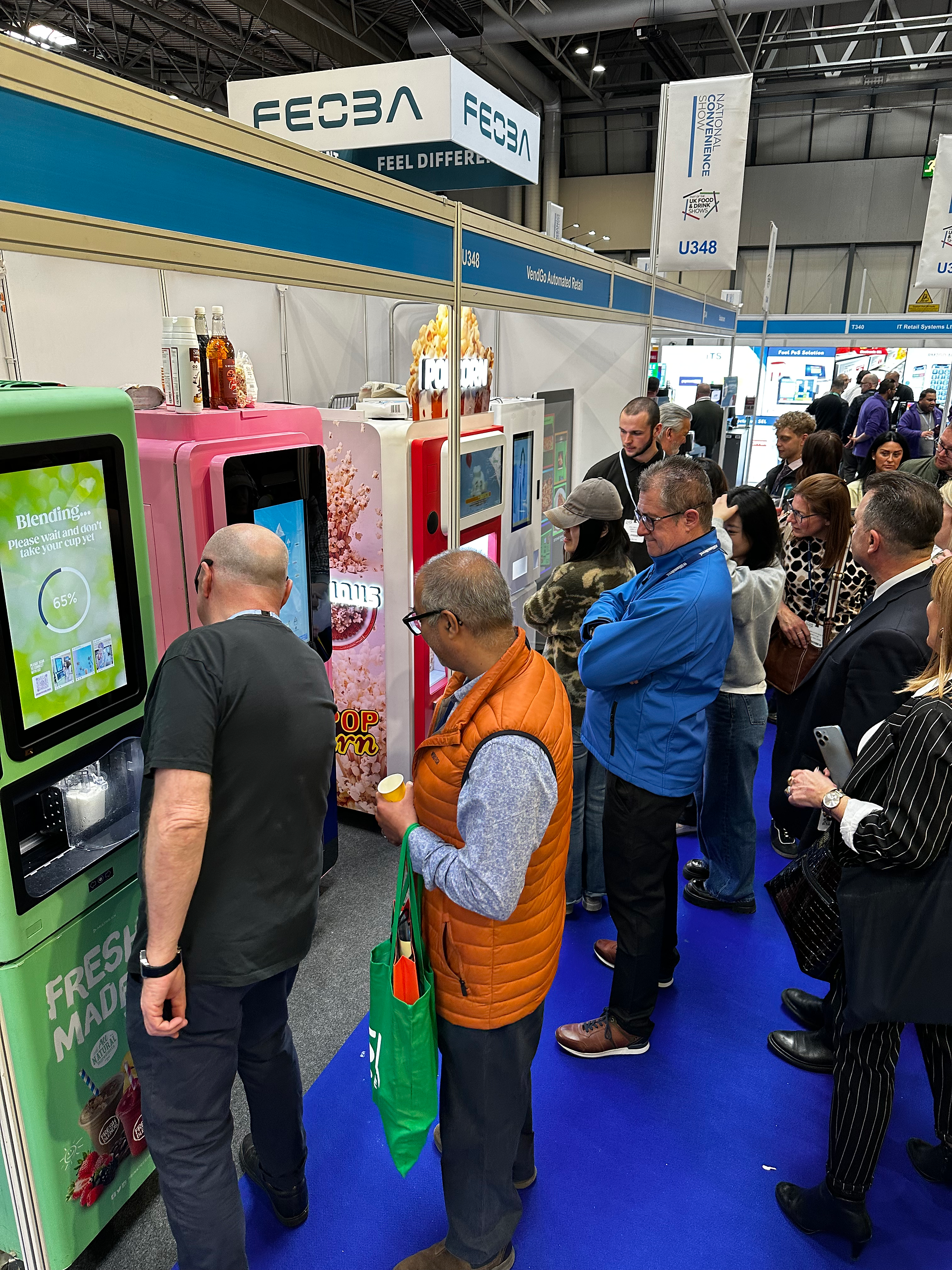 Visitors on a trade show stand
