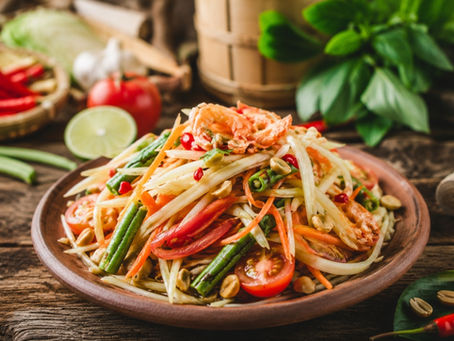 Fresh and spicy authentic Thai green papaya salad Som Tum
