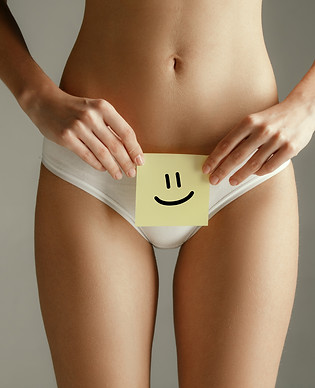 woman-health-female-model-holding-card-near-stomach-young-adult-girl-with-paper-sign-or-sy