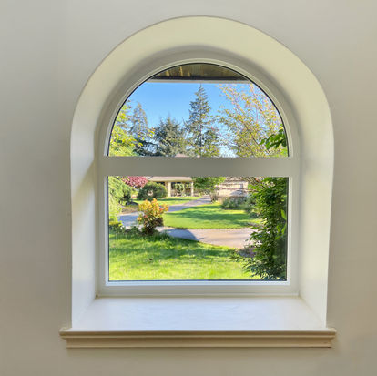Custom combination window with a half-round top and rectangular fixed bottom — classic elegance and extra daylight in one design.