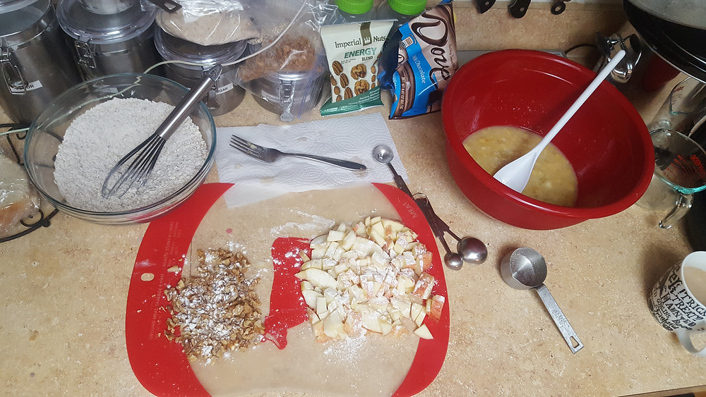 Dry ingredients, walnuts, chopped apples, and wet ingredients