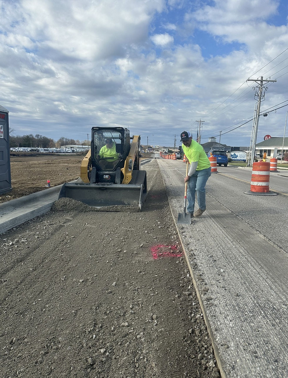 Tolliver & Curl crew working on a commercial paving project