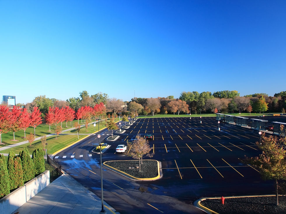 Freshly striped commercial parking lot with clear stall lines