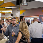 Attendees networking beside a Nimbus Agritech display at the Future Space anniversary event in Bristol.