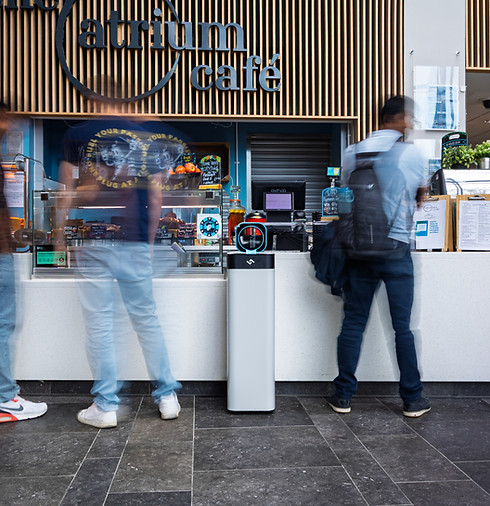 instarinse® unit by Lava Labs positioned at the Atrium Café while customers stand at the counter