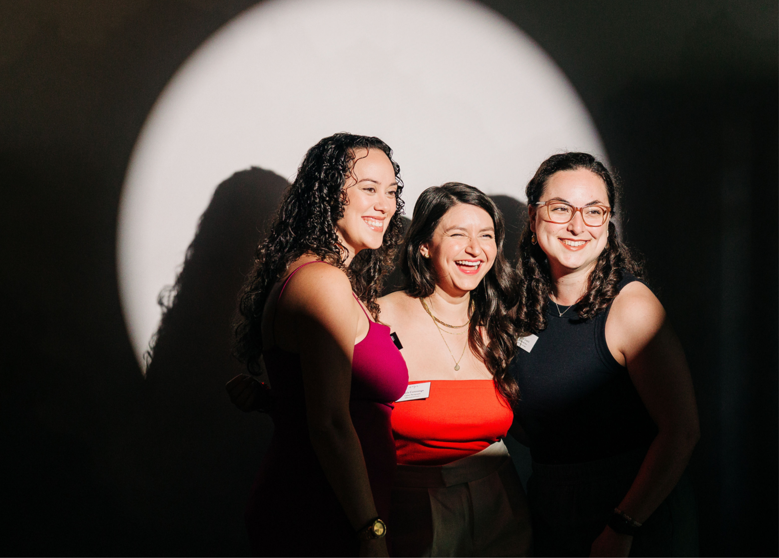 Red carpet spotlight photo booth with dramatic snoot lighting