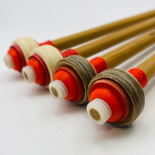 Mixture of the Rawhide Flannel Timpani Mallets by tambourineLAB
