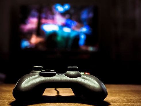 isolated gamepad video game controller on the table.jpg