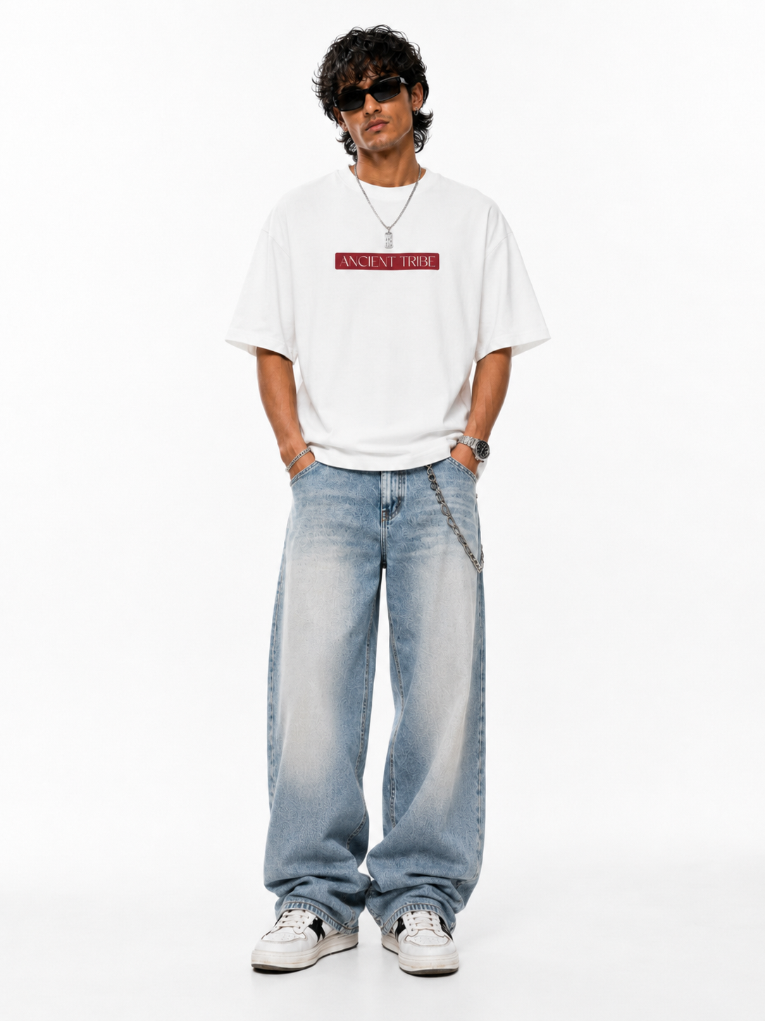 The Scarlet Bloom Tee featuring elegant red cultural motifs on a white canvas